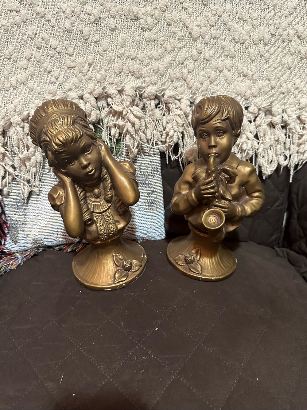 Vintage busts are a 1971 set by Universal Statuary Corp. titled Music to My Ears